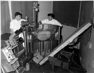 Dave Robinson, George Kossoff checking rail alignment of Mk I scanner, Royal Hospital for Women (late 1962)